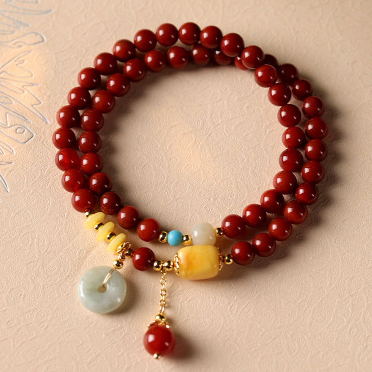 Prosperity & Peace Double-Wrap Bracelet – Red Agate with Jade Donut & Amber Charms
