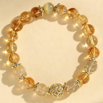 Golden Quartz Prosperity Bracelet – Luminous Talisman with Filigree Fortune Orb