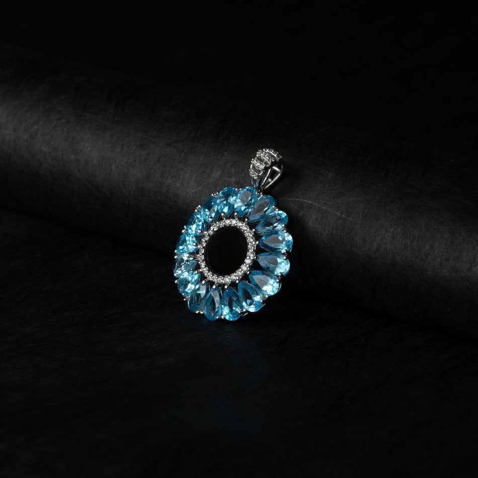 Blue Topaz Halo Circle Silver Pendant – Clarity & Expression